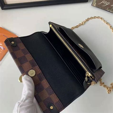 louis vuitton wallet with chain.